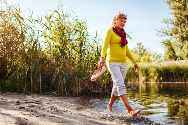 Energetic senior enjoying a peaceful walk, full of vitality.